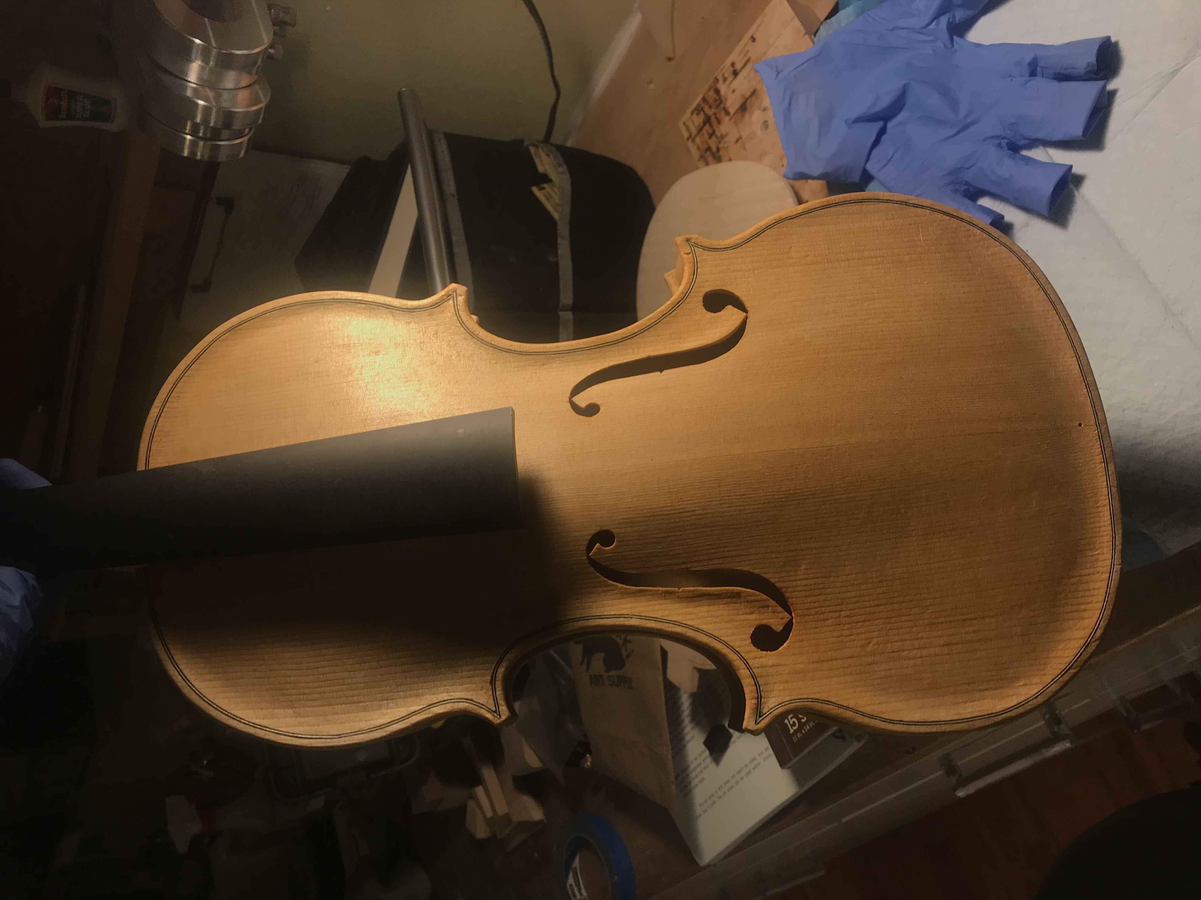 a violin in the white, ready for some color and glazing.